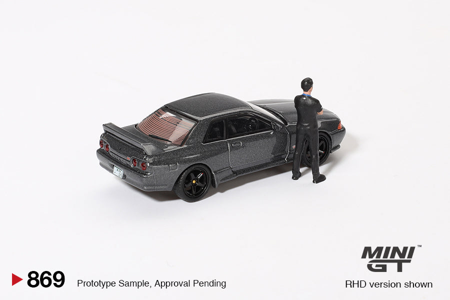 MiniGT 1:64 Nissan Skyline GT-R (R32) Nismo Gunmetal W/ Matsuda Figure – Tsugio Matsuda Collection #869