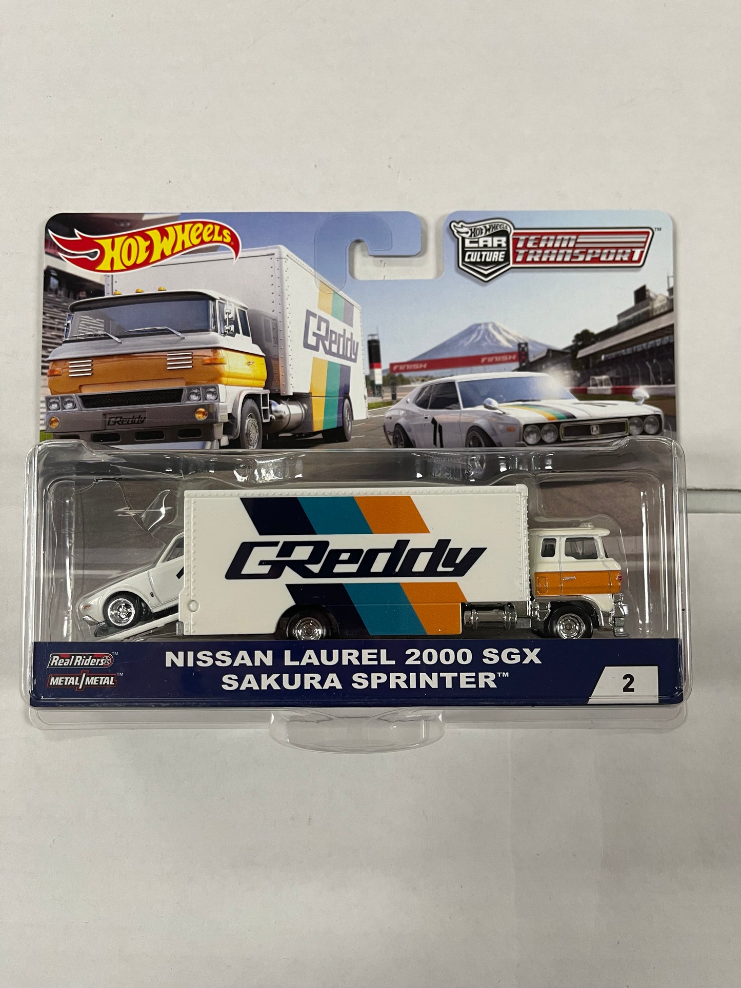 Hot Wheels 1:64 Team Transport Nissan Laurel 2000 SGX