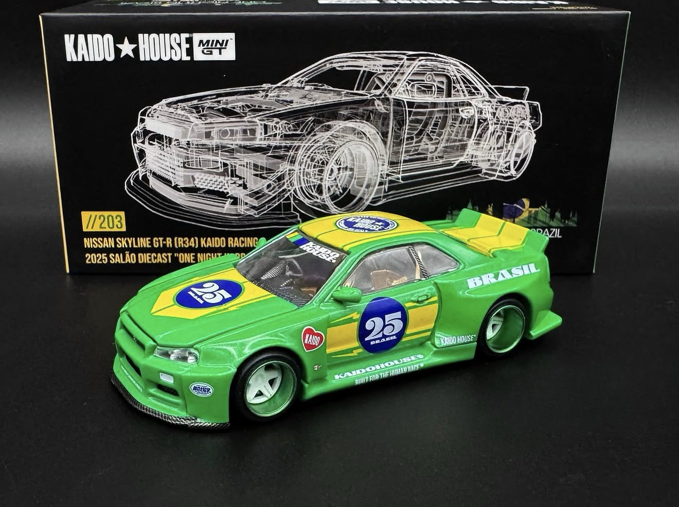 Kaido House 1:64 2025 Salao Diecast Exclusive “One Night In Brazil” Nissan Skyline GT-R R34 Kaido Racing - KHMG203