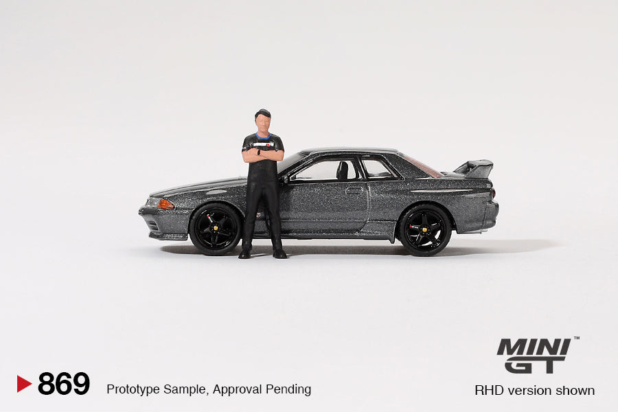 MiniGT 1:64 Nissan Skyline GT-R (R32) Nismo Gunmetal W/ Matsuda Figure – Tsugio Matsuda Collection #869