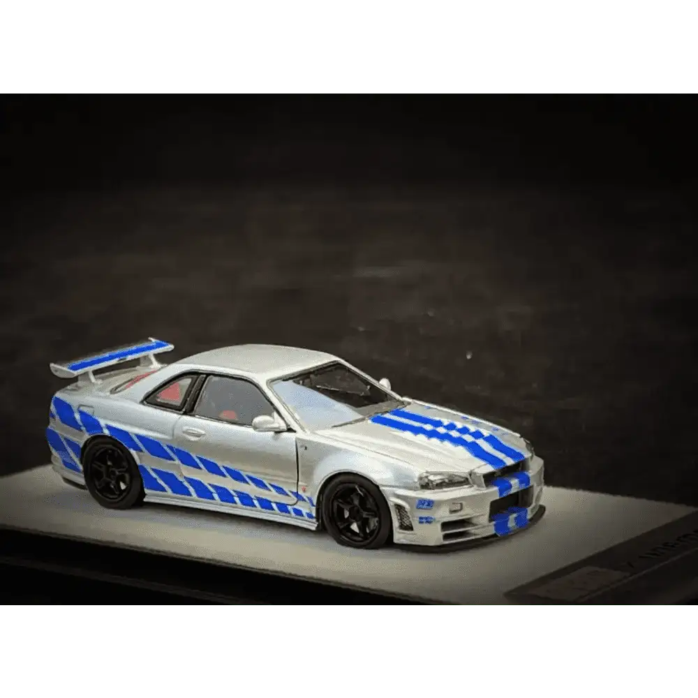 PGM X Onemodel 1:64 Nissan GT-R (R34) Z-Tune Silver W/ Blue Stripe - Fast & Furious