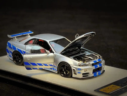 PGM X Onemodel 1:64 Nissan GT-R (R34) Z-Tune Silver W/ Blue Stripe - Fast & Furious