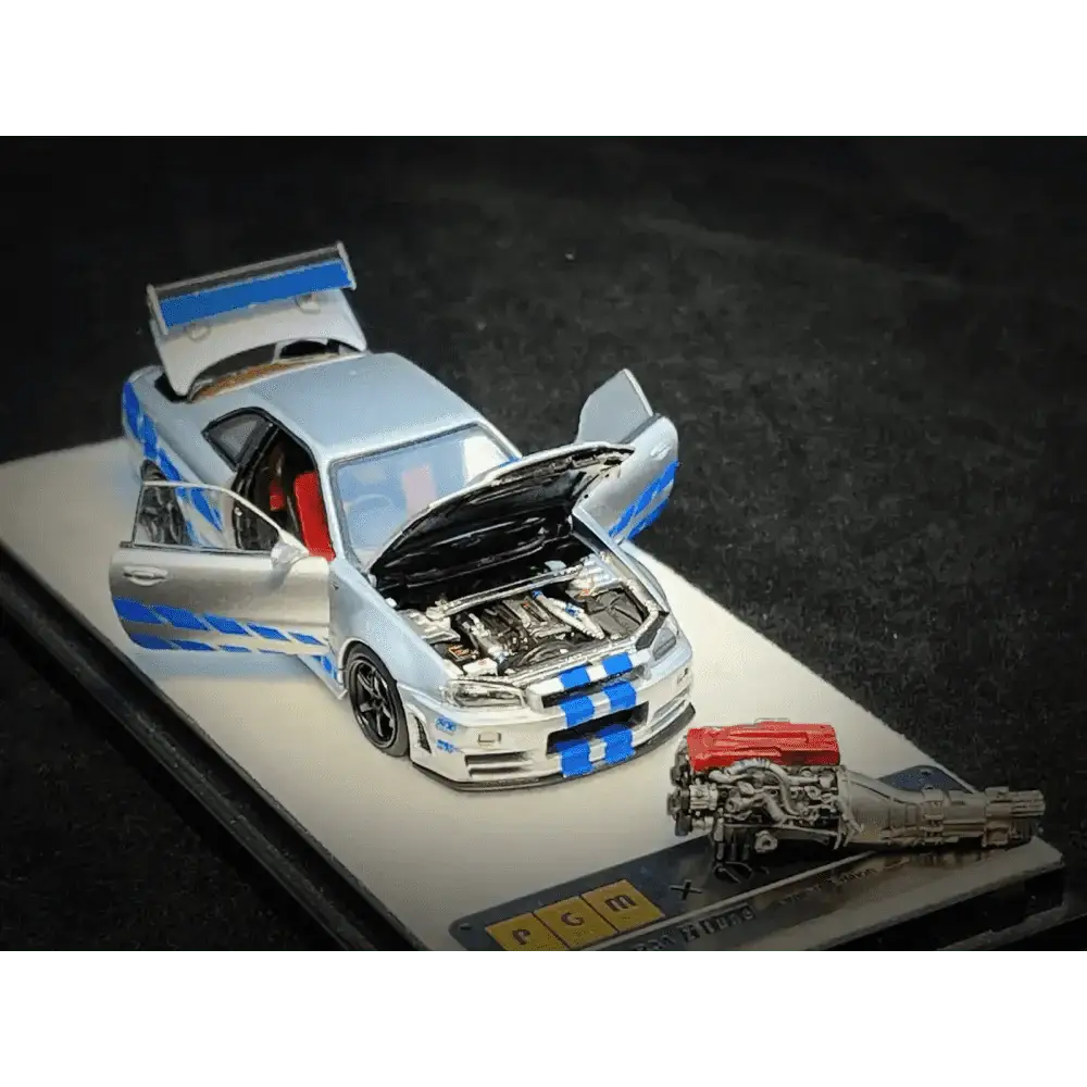 PGM X Onemodel 1:64 Nissan GT-R (R34) Z-Tune Silver W/ Blue Stripe - Fast & Furious