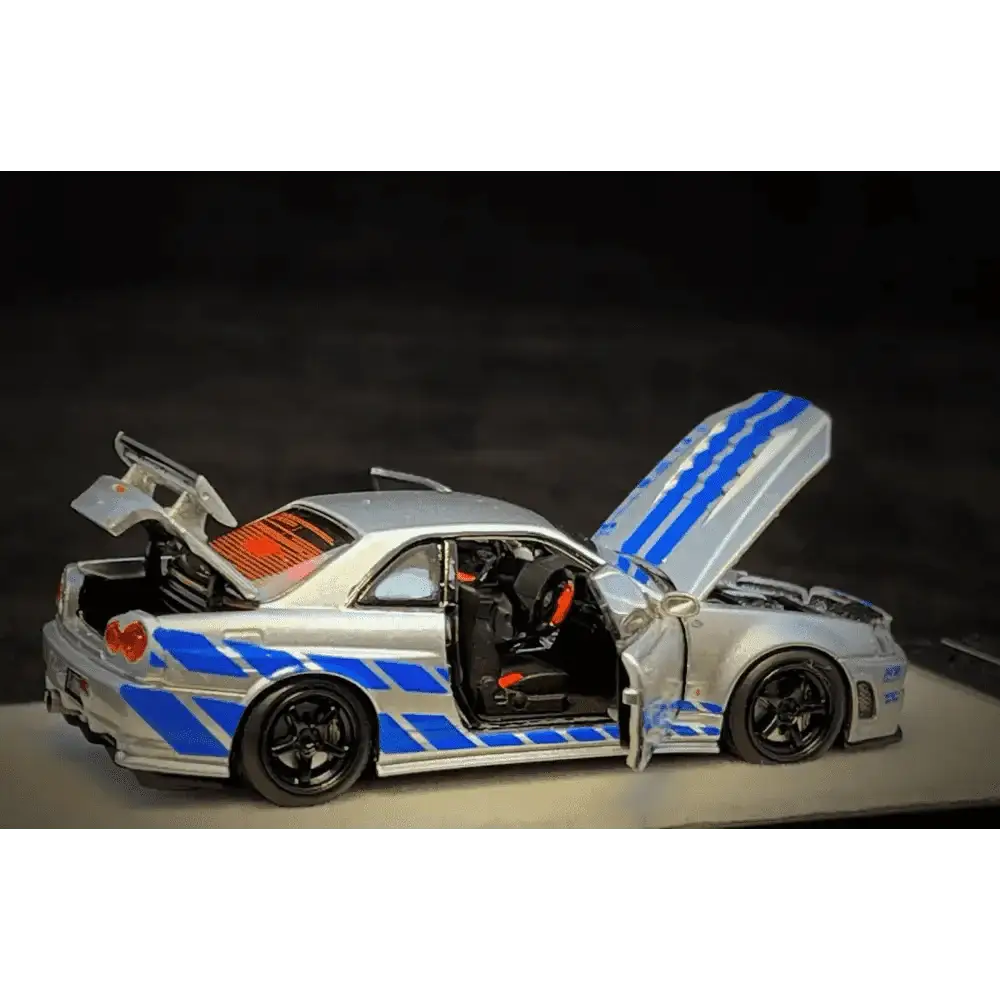 PGM X Onemodel 1:64 Nissan GT-R (R34) Z-Tune Silver W/ Blue Stripe - Fast & Furious