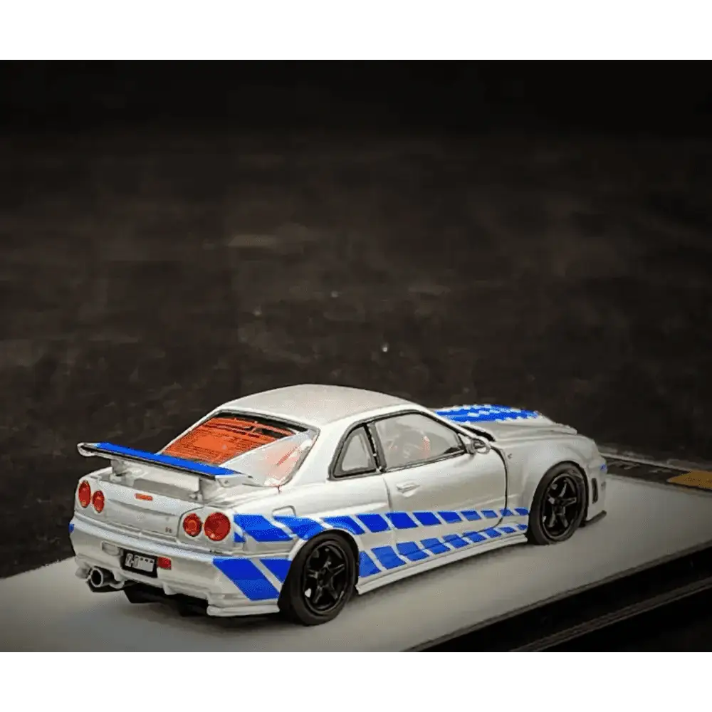 PGM X Onemodel 1:64 Nissan GT-R (R34) Z-Tune Silver W/ Blue Stripe - Fast & Furious