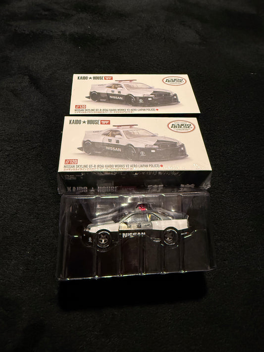 Kaido House 1:64 Nissan Skyline GT-R R34 Kaido Works V2 Aero Police - Regular & Chase PAIR