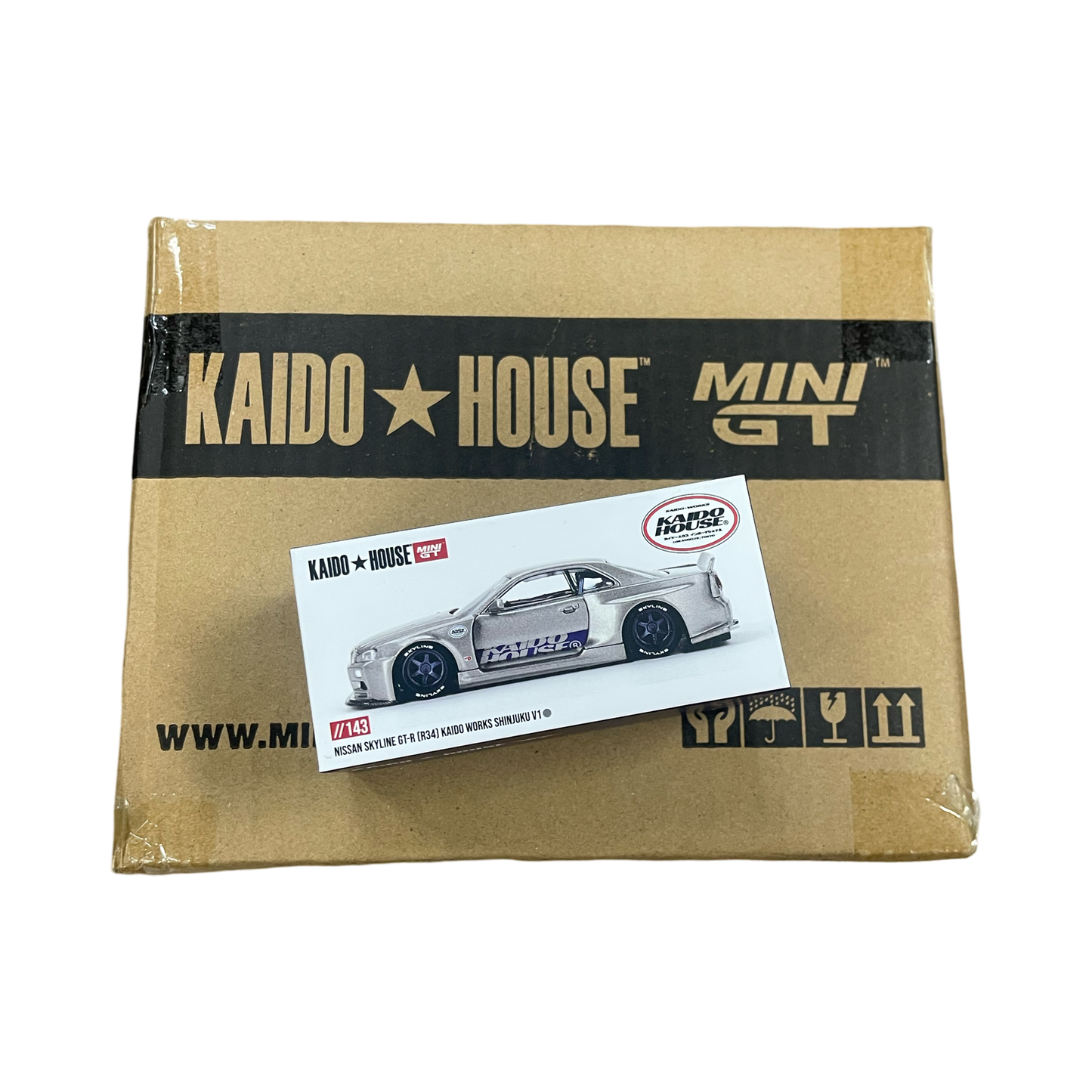 MiniGT X Kaido House 1:64 Nissan Skyline GT-R (R34) Kaido Works SHINJUKU V1 **SEALED CASE**