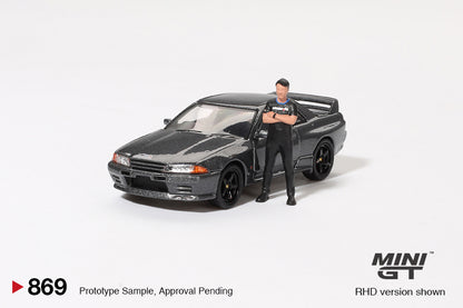 MiniGT 1:64 Nissan Skyline GT-R (R32) Nismo Gunmetal W/ Matsuda Figure – Tsugio Matsuda Collection #869