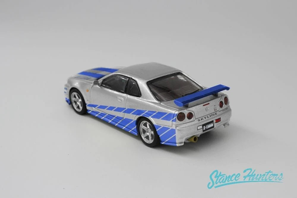 Stance Hunters x ArtWork 1:64 Nissan Skyline GT-R R34 Nismo Z-Tune Silver With Figure (F&F Inspired)