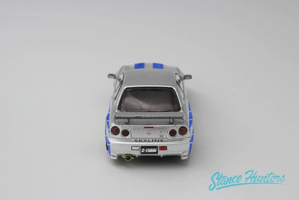 Stance Hunters x ArtWork 1:64 Nissan Skyline GT-R R34 Nismo Z-Tune Silver With Figure (F&F Inspired)